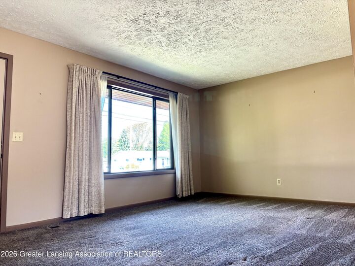 Property Photo:  637 Green Street  MI 48837 