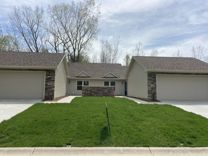 Property Photo:  728 Violet Way  MI 49085 