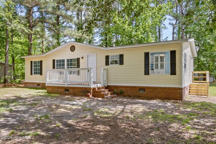 Property Photo:  211 Pond Road  NC 28457 