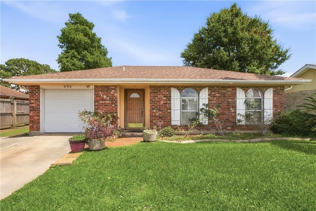 Property Photo:  404 Bertolino Drive  LA 70065 