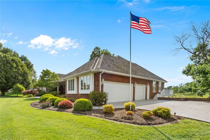 Property Photo:  18 W Champions Boulevard  AR 72758 