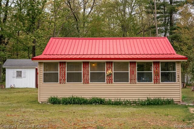 Property Photo:  3385 Woods Road  MI 48625 