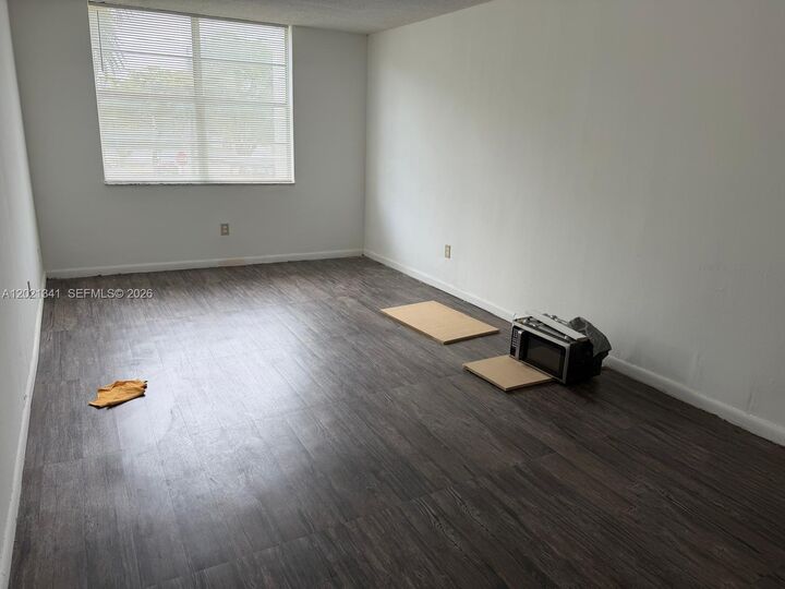 Property Photo: 492 NW 165th St Rd C-209 FL 33169