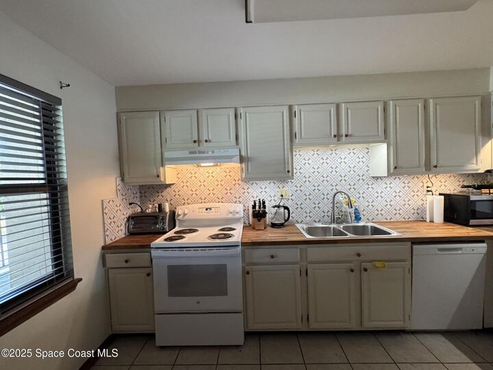 Property Photo:  201 International Drive  FL 32920 