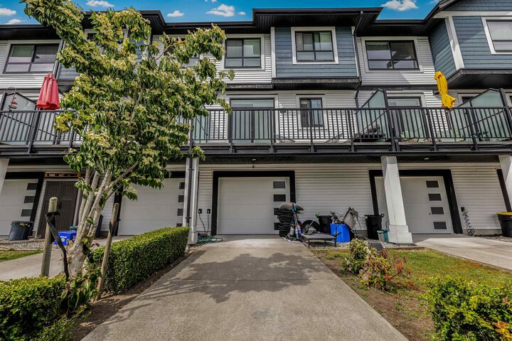Property Photo:  19704 55A Avenue 26  BC V3A 0L2 