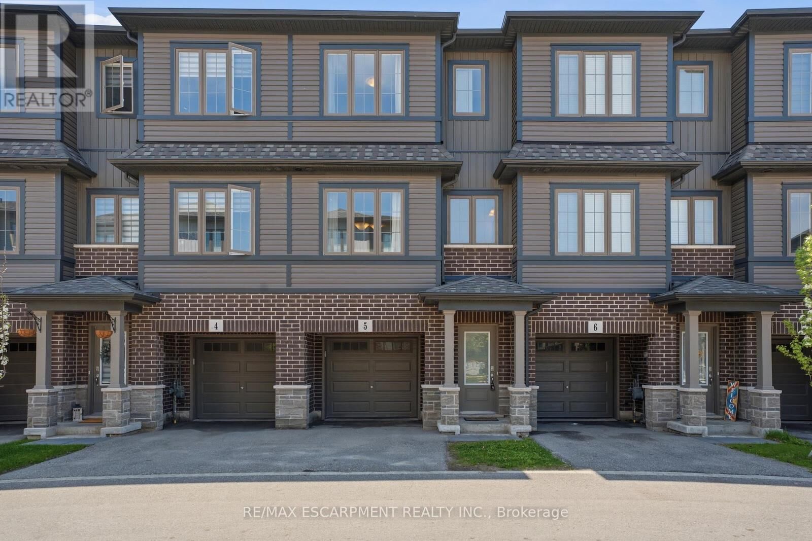 Property Photo: 124 Compass Trail Unit 5 ON N3E 0E3