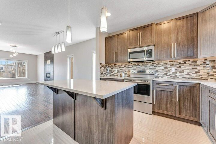 Property Photo:  2604 20 Avenue NW  AB T6T 0Y7 