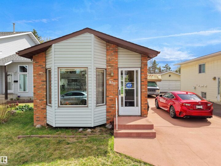 Property Photo:  10711 24 Avenue NW  AB T6J 5P9 
