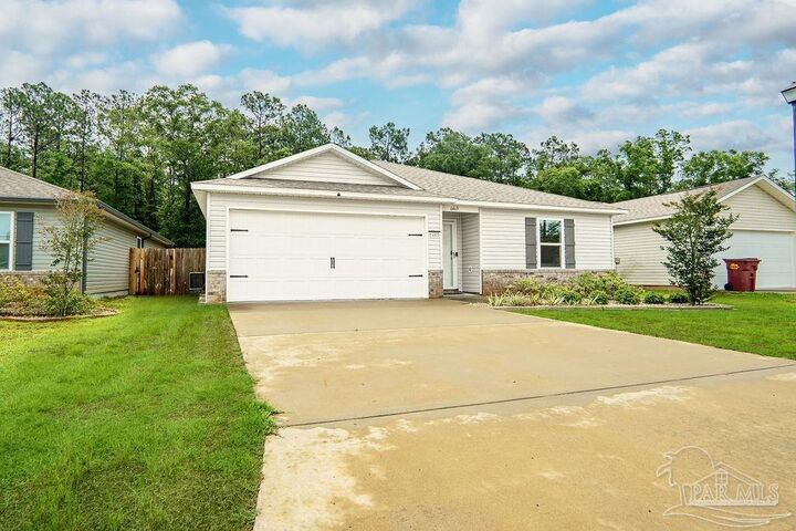 Property Photo: 6469 June Bug Dr FL 32583