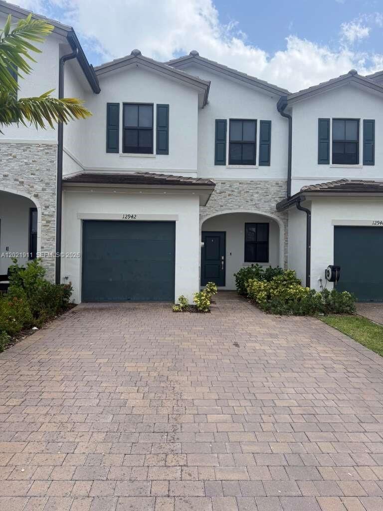 Property Photo:  12942 SW 231st St 12942  FL 33170 