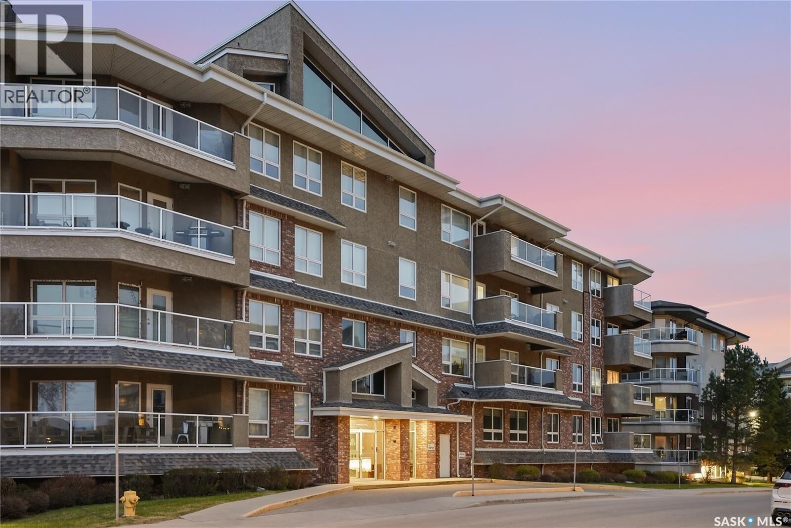 Property Photo:  210 102 Armistice Way  SK S7J 2Z6 