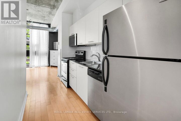 Property Photo: 60 Bathurst Street 210 ON M5V 2P7