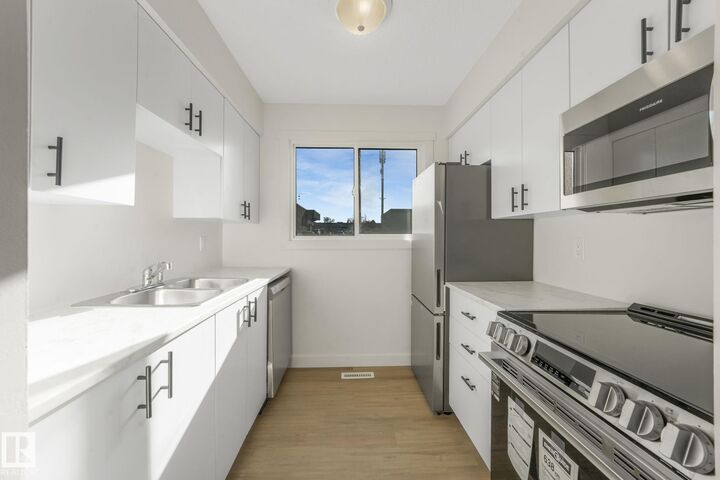 Property Photo: 5833 Riverbend Road NW AB T6H 5A8