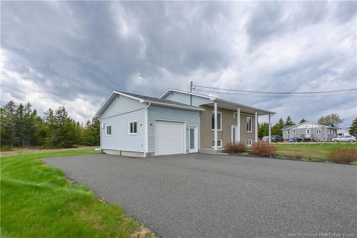 Property Photo: 33 De La Baie Street NB E8N 2A9