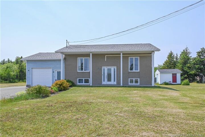Property Photo: 33 De La Baie Street NB E8N 2A9