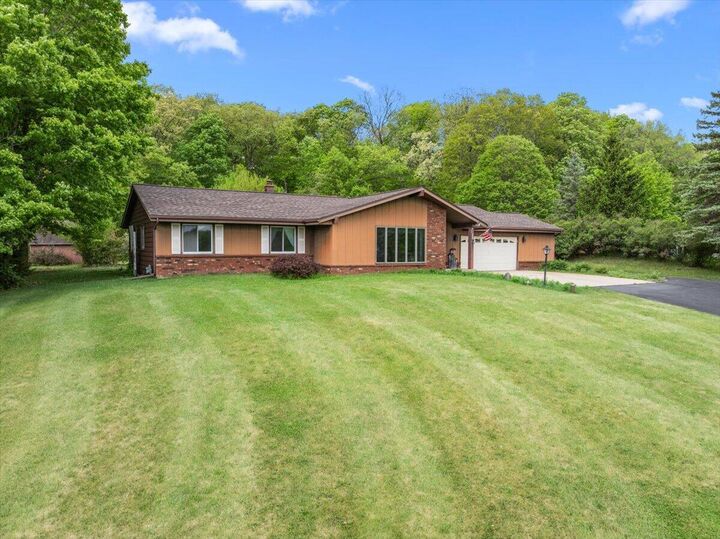 Property Photo: 3455 Birnamwood Dr WI 53086