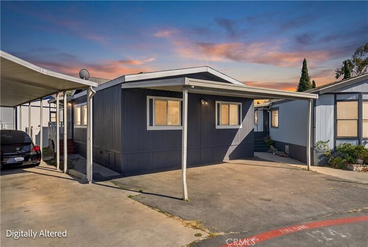 Property Photo:  11101 Imperial 124  CA 90650 