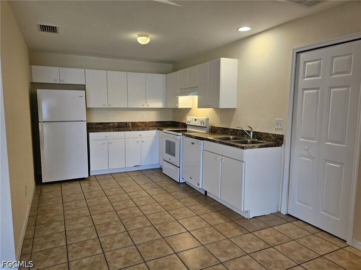 Property Photo:  713 Jenna Avenue S  FL 33973 