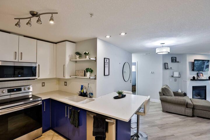 Property Photo:  5115 Richard Road SW 211  AB T3E 7M7 