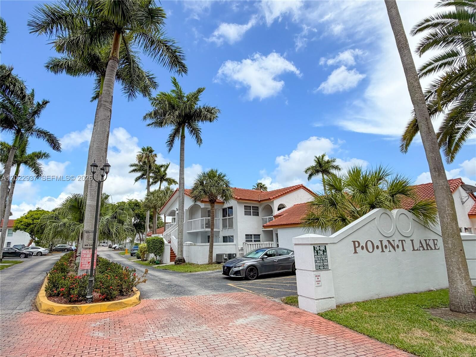 Property Photo:  15355 SW 76th Ter 106  FL 33193 