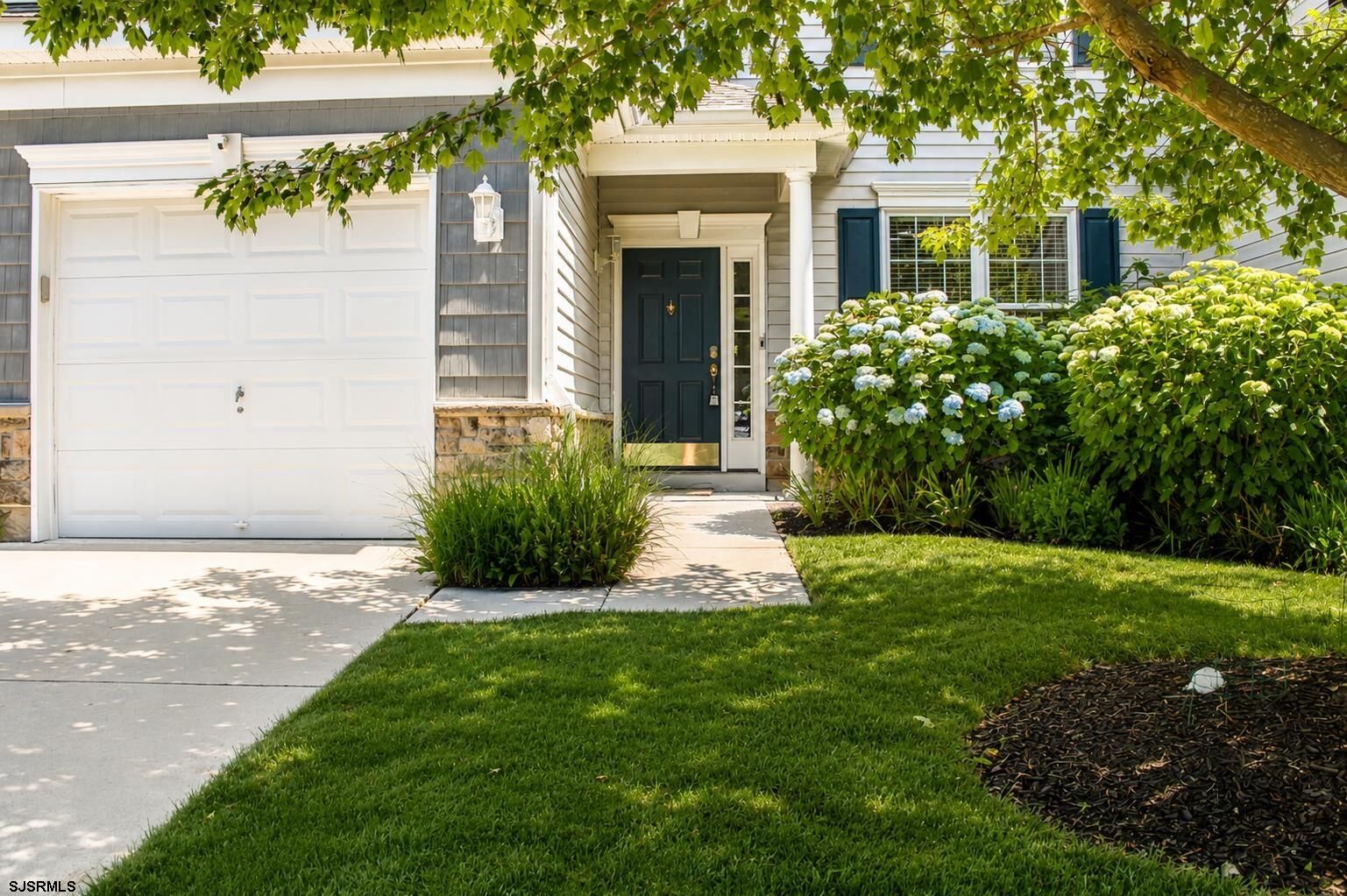 Property Photo: 308 Osprey Ct 308 - Townhouse NJ 08210