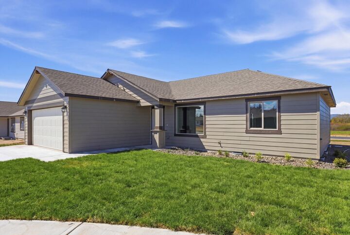Property Photo:  1211 N Layton Ave  WA 99006 