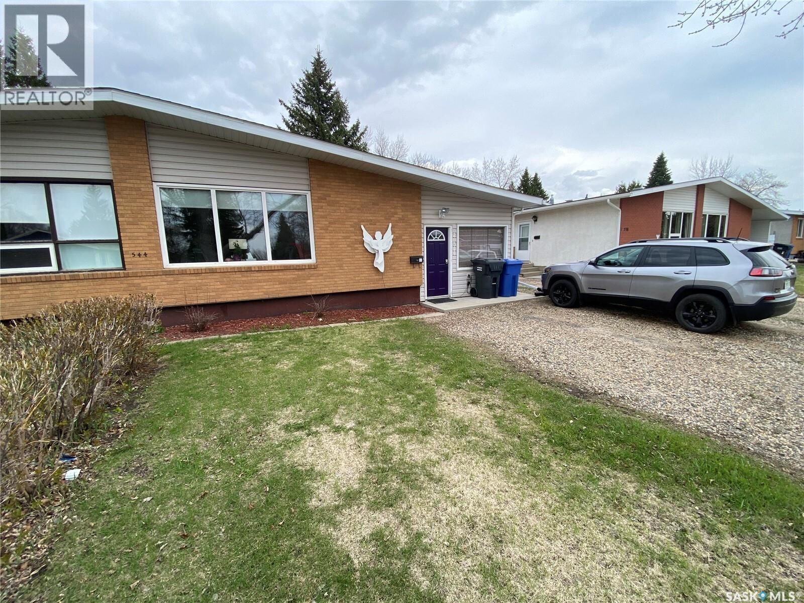 Property Photo:  2 544 Circlebrooke Drive  SK S3N 2T4 