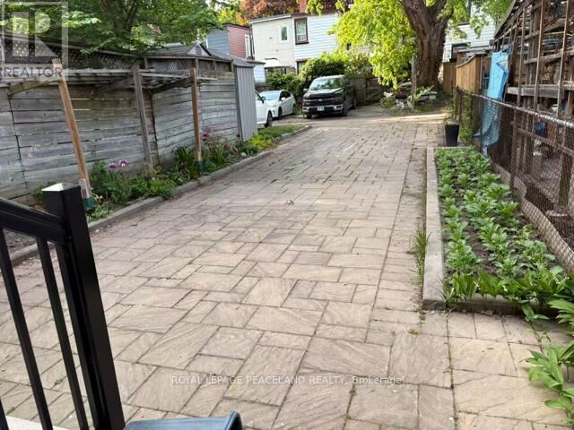 Property Photo:  1320 Dundas Street Main+Bs  ON M4M 1S6 