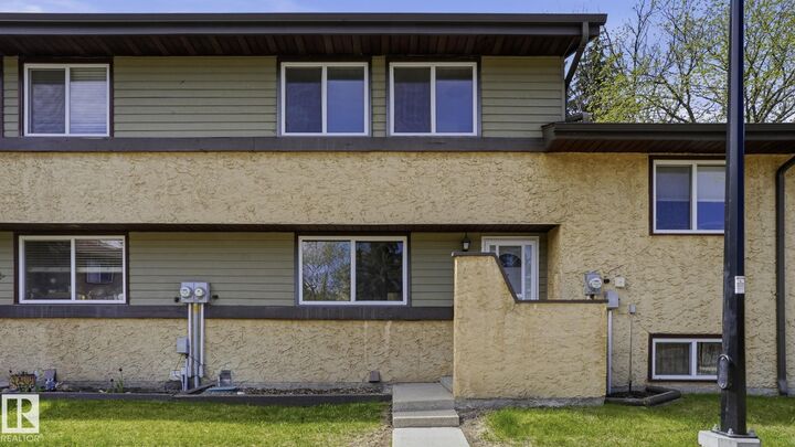 Property Photo:  210 Woodbridge Way  AB T8A 3Y3 