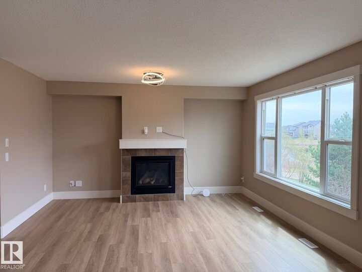 Property Photo:  648 178 Street SW  AB T6W 2L6 