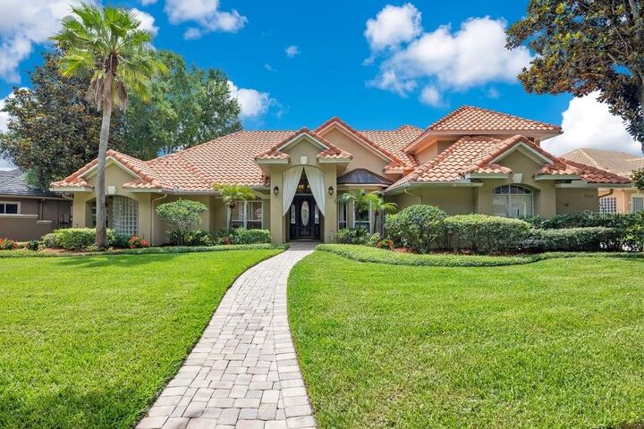 Property Photo: 7718 Debeaubien Drive FL 32835