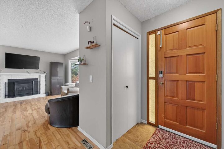 Property Photo: 103 Macewan Drive NW AB T3K 2G2