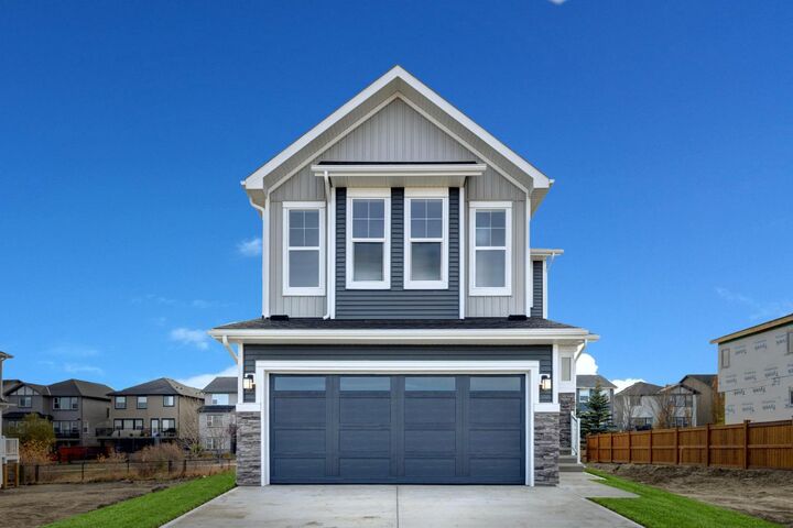 Property Photo: 243 Silver Spruce Grove SW AB T2X 5M2