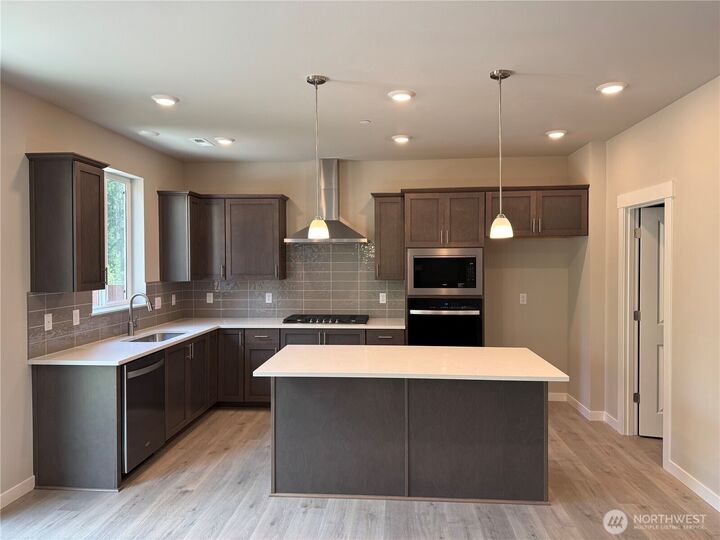 Property Photo:  3804  98th Avenue Ct E 6  WA 98371 