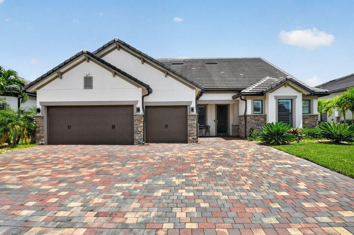 Property Photo: 8433 Vaulting Drive FL 33467