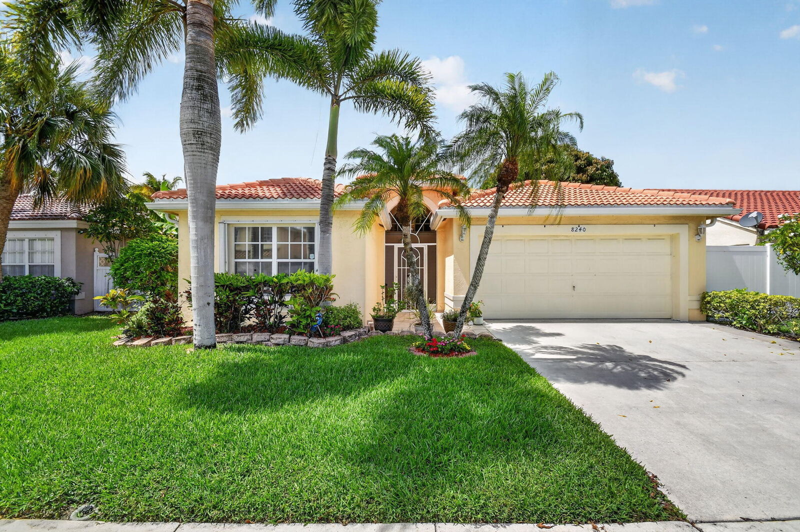 Property Photo:  8240 White Rock Circle  FL 33436 