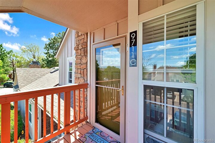 Property Photo:  9711 W Chatfield Avenue C  CO 80128 