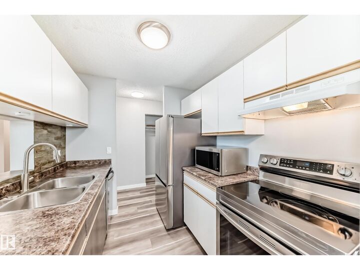 Property Photo:  #306 2508 50 St NW  AB T6L 6X9 