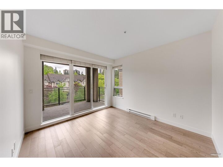 Property Photo: 3399 Noel Drive 411 BC V3J 0G8