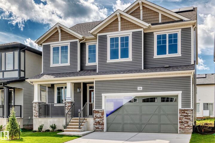 Property Photo: 1516 205 Street NW AB T6M 3E7