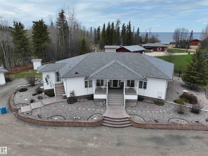 Property Photo: 1649 McFarlane Pl AB T0G 0K0