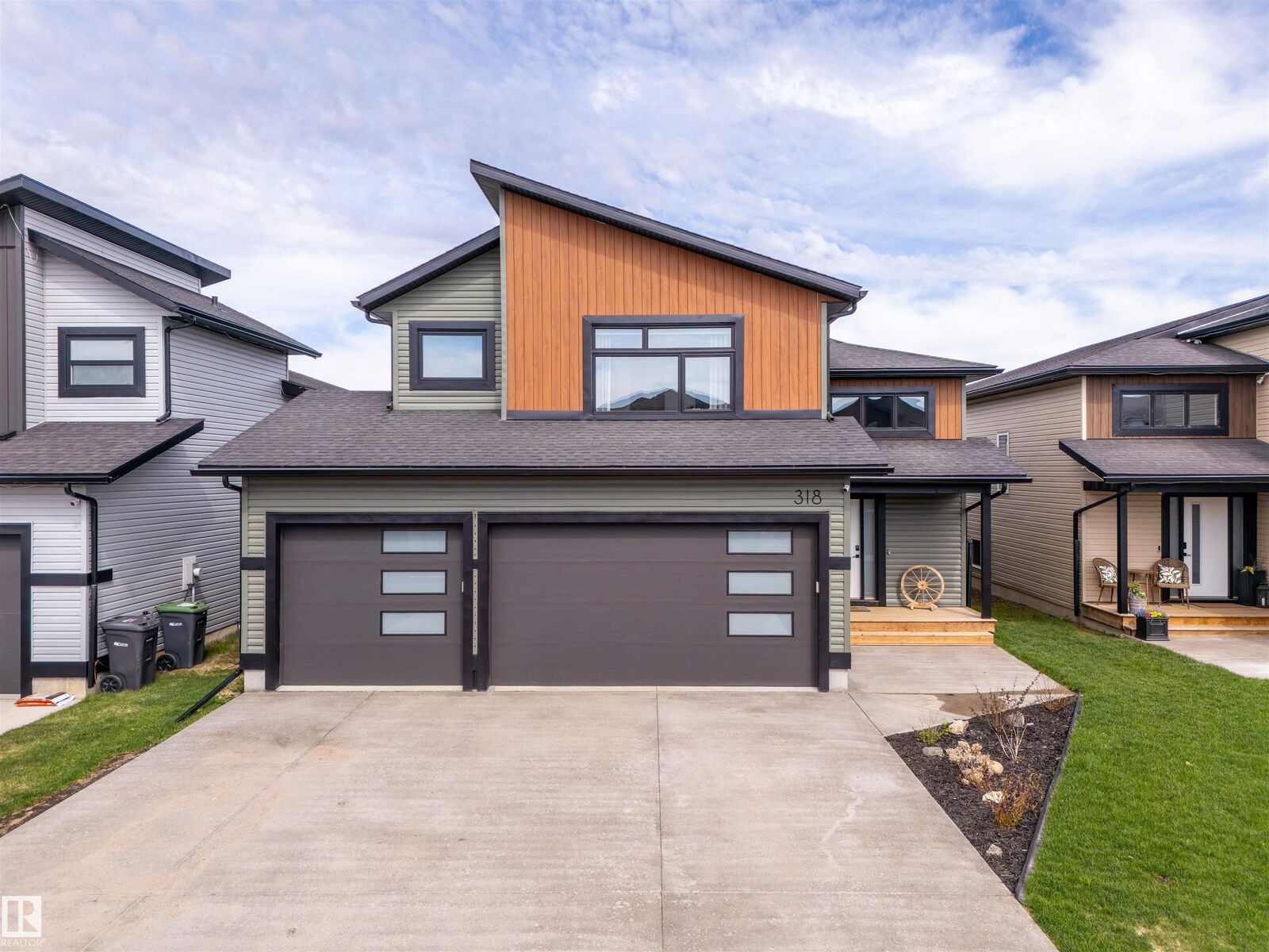 Property Photo: 318 Waterton Way AB T9M 0L4