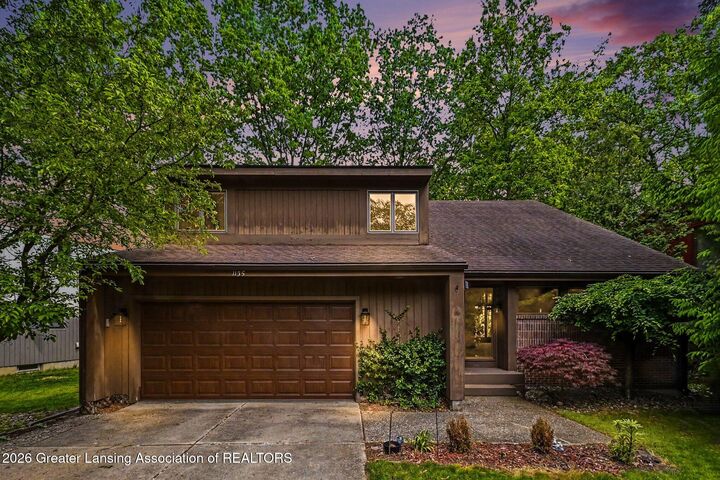 Property Photo:  1135 Woodwind Trail  MI 48840 