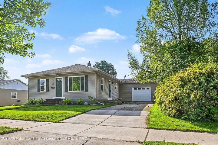 Property Photo: 729 Riverside Drive MI 48875
