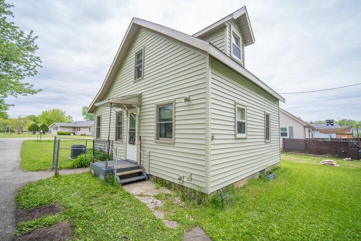 Property Photo:  7180 N River Rd  WI 53090 