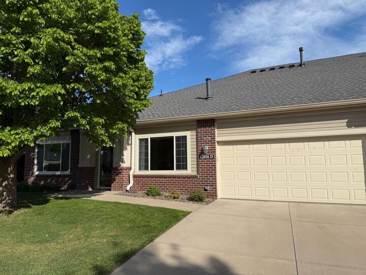 Property Photo: 12016 Vermillion Street NE D MN 55449