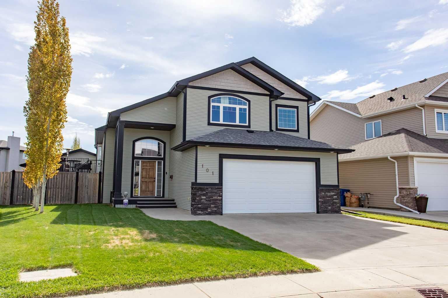 Property Photo: 101 Coachman Way AB T4M 0B4
