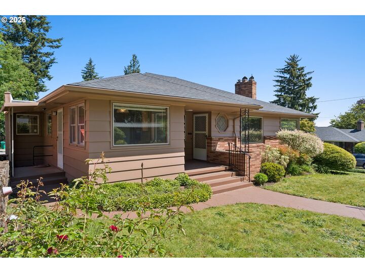 Property Photo:  6939 SE Yamhill St  OR 97215 