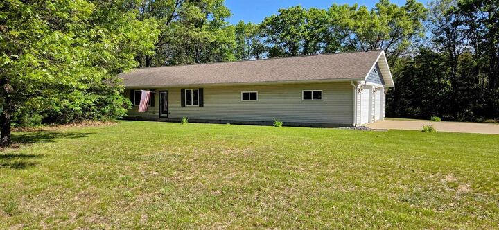 Property Photo:  W7748 Hwy 12  WI 54615 