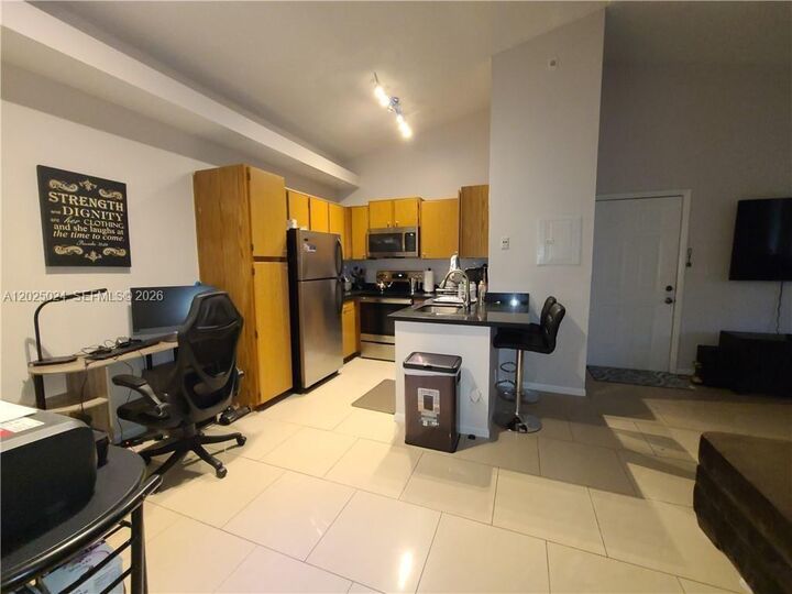 Property Photo: 631 Lyons Rd 12205 FL 33063